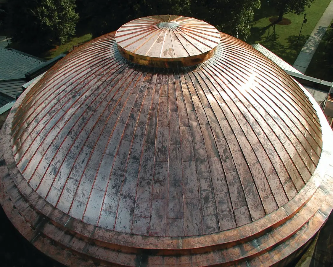 Craftsman Roofing crew installing a new roof in Tusculum